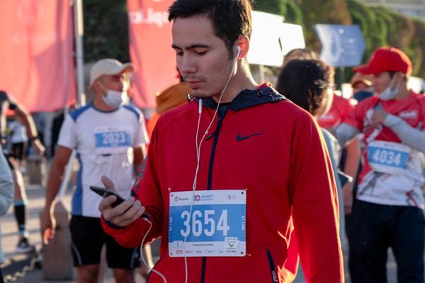 Person running outdoors during sunrise for energy boost